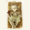 Niño Jesús en resina con pesebre